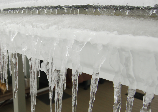 Ice dam formation from clogged gutters